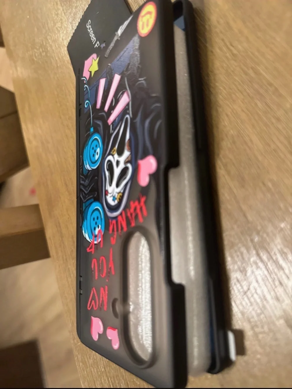 Stylish Black Graphic Phone Case with Pink Accents